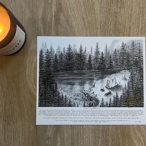 May include: A black and white print of a forest scene with a lake and a tent, titled "The Clearing." A lit candle in a brown jar is in the upper left corner. The print has text at the bottom.