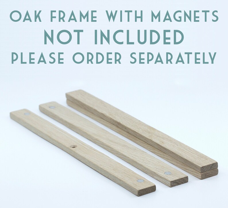 May include: Three wooden strips for a picture frame, made of oak wood. The strips are different lengths and have small metal magnets embedded in them. The text "OAK FRAME WITH MAGNETS NOT INCLUDED PLEASE ORDER SEPARATELY" is visible at the top of the image.