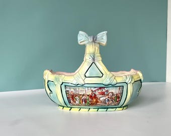 Maceta de mayólica Art Nouveau con asa y lazo. Maceta exterior Art Déco. Maceta joya con motivo romano. Joya de cerámica divertida y kitsch.