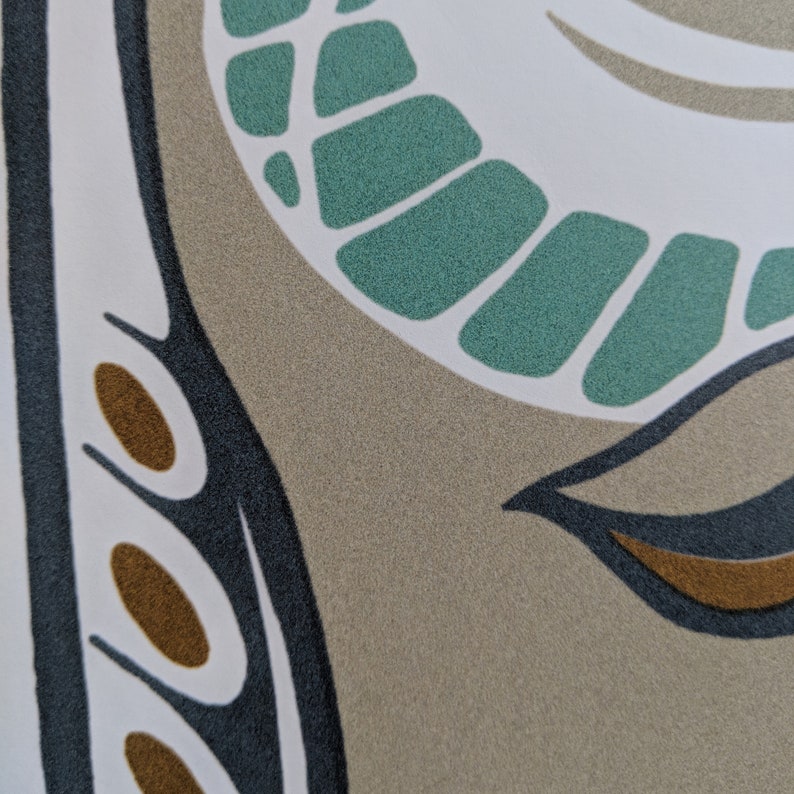 May include: Abstract pattern with teal, brown, black, and white colors. The pattern features a curved shape with a series of teal ovals and a brown oval.