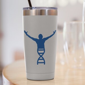 May include: A stainless steel tumbler with a white powder coat finish. The tumbler features a blue silhouette of a person with arms raised, standing on top of a blue DNA double helix. The tumbler has a black straw.