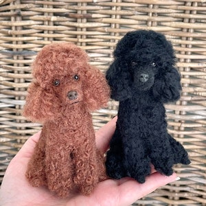 Black or brown poodle sculpture