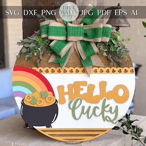 May include: A round wooden sign with a green and brown bow, a rainbow, a pot of gold, and the text "Hello Lucky".
