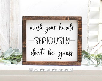 May include: A wooden sign with the text "wash your hands -SERIOUSLY- don't be gross" in black cursive font.