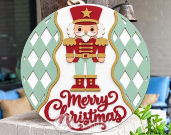 Round Door Hanger SVG Nutcracker Merry Christmas Sign, Layered Argyle Christmas Door Decor, Holiday Porch Sign For Laser Cutting