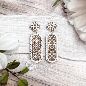 May include: A rustic wooden sign with the text "Welcome to our home" in white lettering. The sign features a distressed finish and a simple, inviting design, perfect for a front porch or entryway.