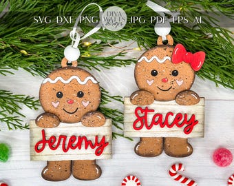 May include: Two gingerbread man ornaments with painted faces and red bows. Each ornament holds a wooden sign with a name, "Jeremy" and "Stacey".