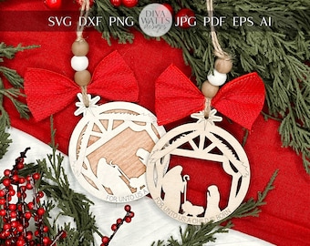 May include: Two wooden Christmas decorations with a red bow and beads. The decorations are shaped like a manger with the text "For unto us a child is born" on each.