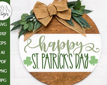 May include: A round wooden sign with a burlap bow and green leaves. The sign has a white background with the text "happy ST. PATRICK'S DAY" in green.