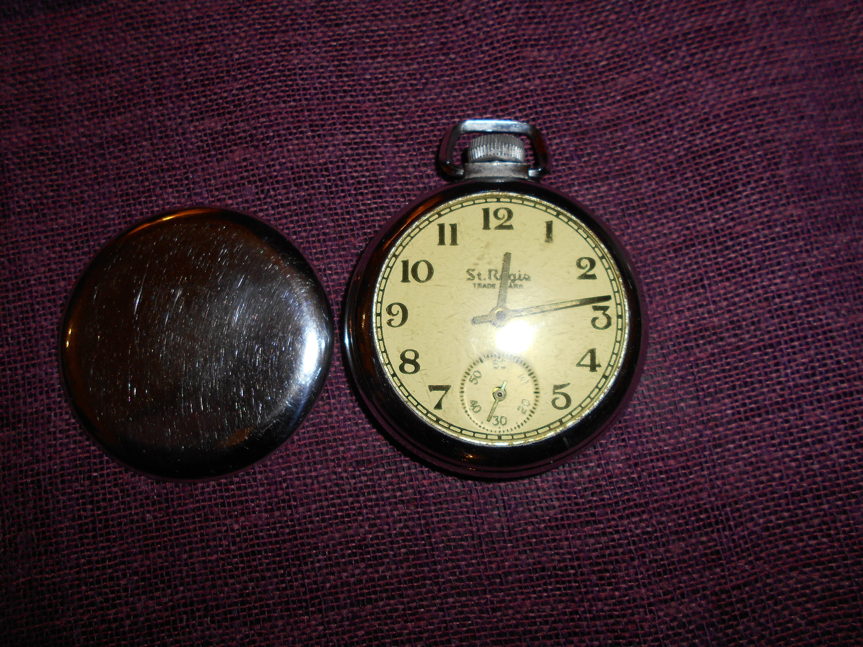 Sun mark st store regis pocket watch