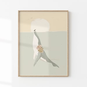 May include: A framed illustration of a whale with a bouquet of flowers on its back, swimming in the ocean with a small bird perched on its head. The background is a soft blue and beige colour.