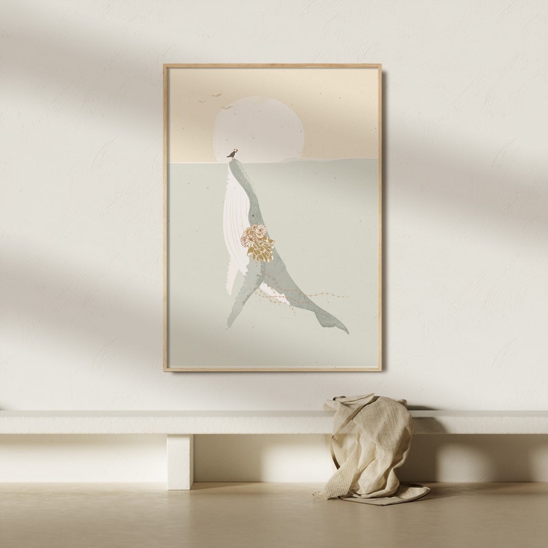 May include: A digital art print featuring a light blue whale with a floral design on its side, swimming in a light blue ocean with a yellow sun in the background.