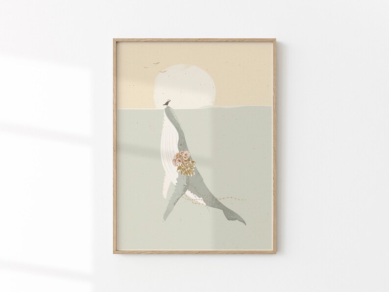May include: A framed illustration of a whale with a bouquet of flowers on its back, swimming in the ocean with a small bird perched on its head. The background is a soft blue and beige colour.