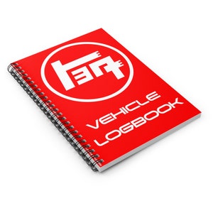 May include: A red spiral bound notebook with a white Toyota logo and the text "VEHICLE LOGBOOK" printed on the cover.