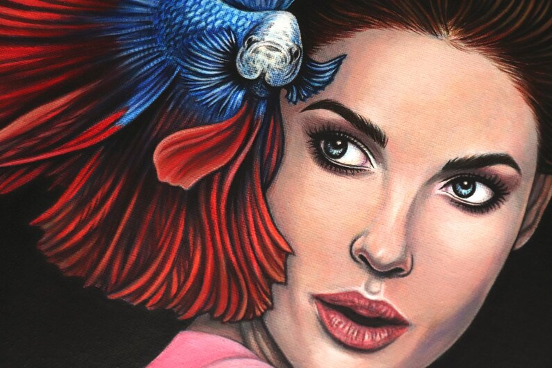 May include: A detailed illustration featuring a person with dark hair and light eyes positioned next to a vibrant blue and red betta fish. The fish has long, flowing fins that extend behind the person's head, creating a colorful contrast.