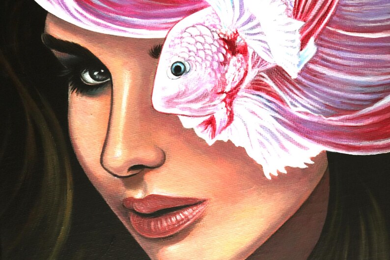 May include: An oil painting on canvas depicting a close-up of a face with dark hair. A pink and white betta fish is positioned over the right eye, with its flowing fins extending upward and outward, blending into the subject's hair.