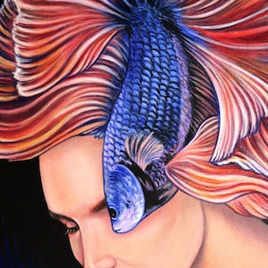 May include: A detailed painting depicting a person with closed eyes, whose hair is replaced by the flowing, vibrant red and orange fins of a blue betta fish. The fish's body rests vertically against the forehead, featuring textured blue scales.