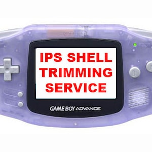 May include: A purple Game Boy Advance with a clear shell. The screen displays the text "IPS SHELL TRIMMING SERVICE" in red letters.