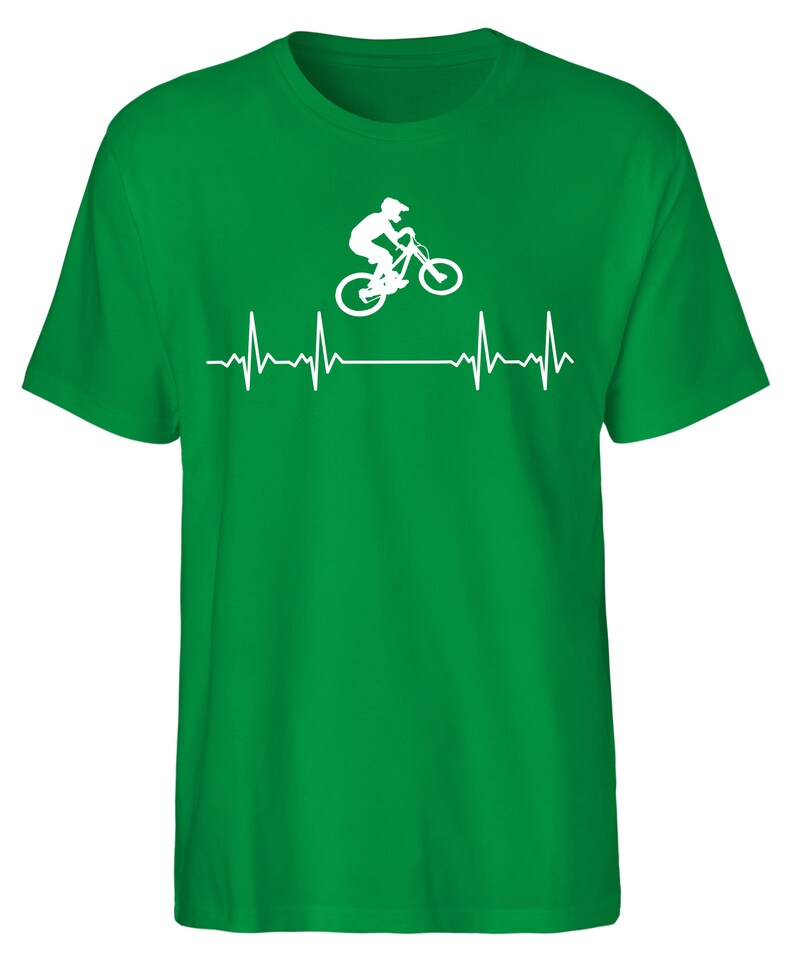 May include: Green t-shirt featuring a white silhouette of a person riding a mountain bike with a heartbeat graphic below.