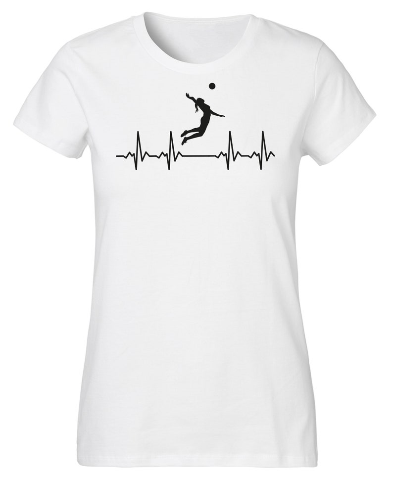 May include: White t-shirt with a black silhouette of a volleyball player spiking a ball, with a heartbeat graphic below.