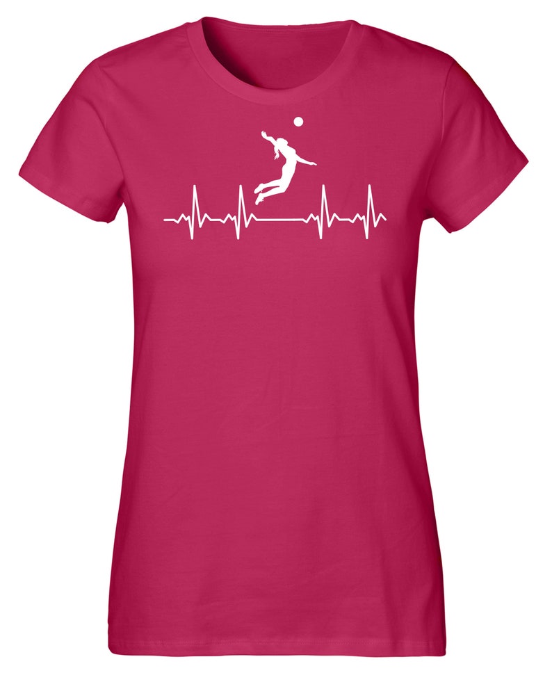May include: A pink women's t-shirt with a white silhouette of a volleyball player spiking the ball, with a white heartbeat line below.