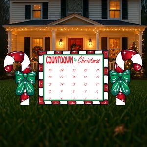 May include: A red and white candy cane countdown sign with a green bow and lights. The sign says "COUNTDOWN to Christmas" and has numbers 1-25 on it.