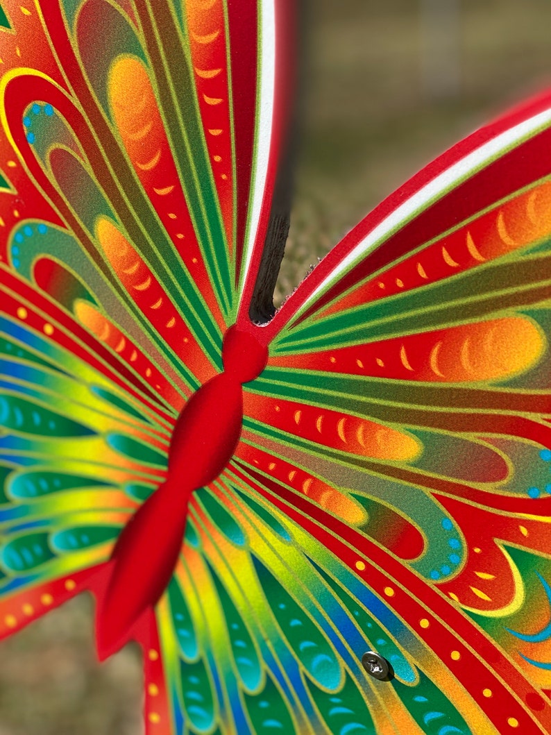 body of Orange and yellow butterfly garden stake, Orange and yellow butterfly garden stake:  whimsical orange butterfly lawn signs with playful patterns and vivid hues