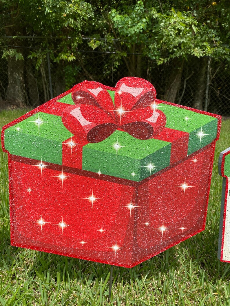 A Christmas Present Yard Decoration-bright and colorful gift box 3D design in green, red white with Christmas red box and a red bow