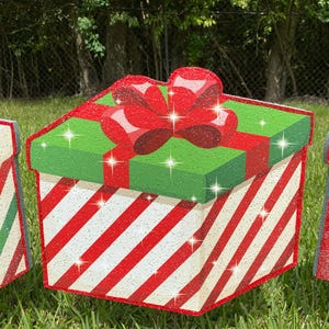 A Christmas Present Yard Decoration-bright and colorful gift box 3D design in green, red white with Christmas red and white stripes and a red bow