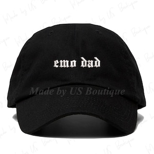 May include: Black baseball cap with white embroidered text that reads "emo dad".