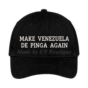 May include: Black baseball cap with white embroidered text that reads "MAKE VENEZUELA DE PINGA AGAIN" and "Made by US Boutique".