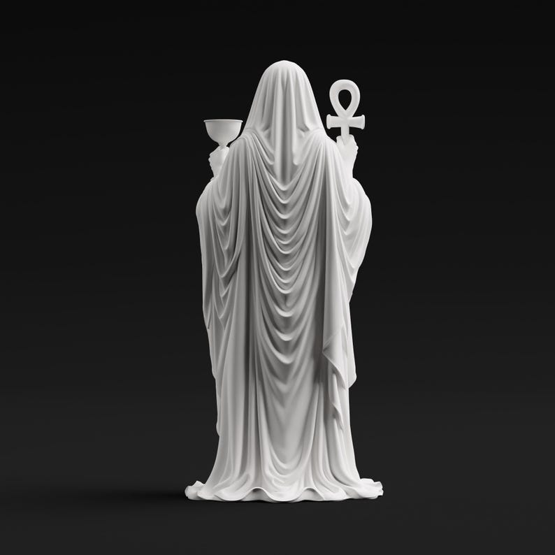 May include: A white statue of a cloaked figure viewed from behind, draped in flowing fabric that falls to the base. The figure holds a chalice in the right hand and an ankh symbol in the left hand, with the hood covering the head completely.