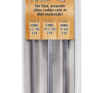 May include: A package of Olson PGT Double Reverse Tooth Scroll Saw Blades. The package contains 6 blades of each size: #5RG 12/8R TPI, #7RG 10.5/8R TPI, and #9RG 9/6R TPI. The blades are made in the USA.