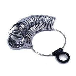 May include: A silver ring sizer with a black plastic handle. The sizer has a range of sizes from 1 to 13. The sizer is a useful tool for jewelers and anyone who needs to measure their ring size.
