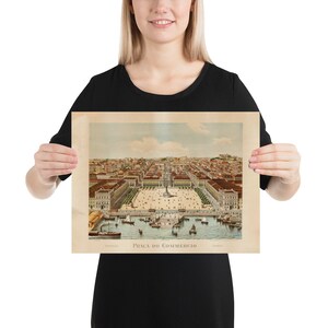 May include: A vintage print of Pra&ccedil;a do Com&eacute;rcio in Lisbon, Portugal, featuring a detailed aerial view of the square, buildings, and harbor. The print has a sepia tone and includes the text "Pra&ccedil;a do Com&eacute;rcio" and "Lisboa".