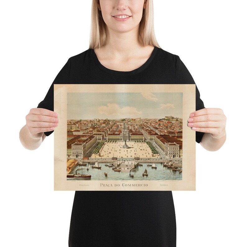 May include: A vintage print of Pra&ccedil;a do Com&eacute;rcio in Lisbon, Portugal, featuring a detailed aerial view of the square, buildings, and harbor. The print has a sepia tone and includes the text "Pra&ccedil;a do Com&eacute;rcio" and "Lisboa".