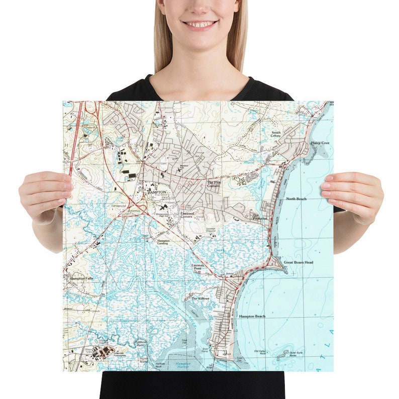 May include: A vintage map of Hampton, Virginia, showing the town and surrounding area. The map is printed on a white background with blue and green lines representing water features. The map includes the names of streets, roads, and landmarks.