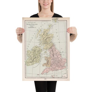 May include: A vintage map of the British Isles, showing the different kingdoms and regions that existed in the 9th century. The map is printed on a cream-colored paper with a light blue background. The map is bordered by a black frame.