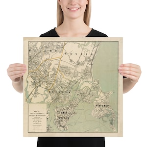 May include: Vintage map of Chelsea, Everett, Revere, and Winthrop, Massachusetts. The map is printed on cream-coloured paper with brown and green lines and text. The map shows the streets and waterways of the area.