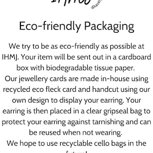 May include: Eco-friendly packaging for jewellery. The text reads "Cartilage Chain & Hoop Earrings" and "Eco-friendly Packaging". The text also says "We try to be as eco-friendly as possible at IHMJ. Your item will be sent out in a cardboard box with biodegradable tissue paper. Our jewellery cards are made in-house using recycled eco fleck card and handcut using our own design to display your earring. Your earring is then placed in a clear gripseal bag to protect your earring against tarnishing and can be reused when not wearing. We hope to use recyclable cello bags in the future!"
