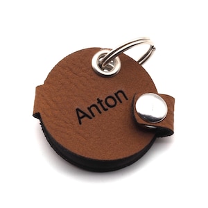 Dog tag bag with push button engraving Brown made of imitation leather engraved on both sides Diameter approx. Ø30mm Circle