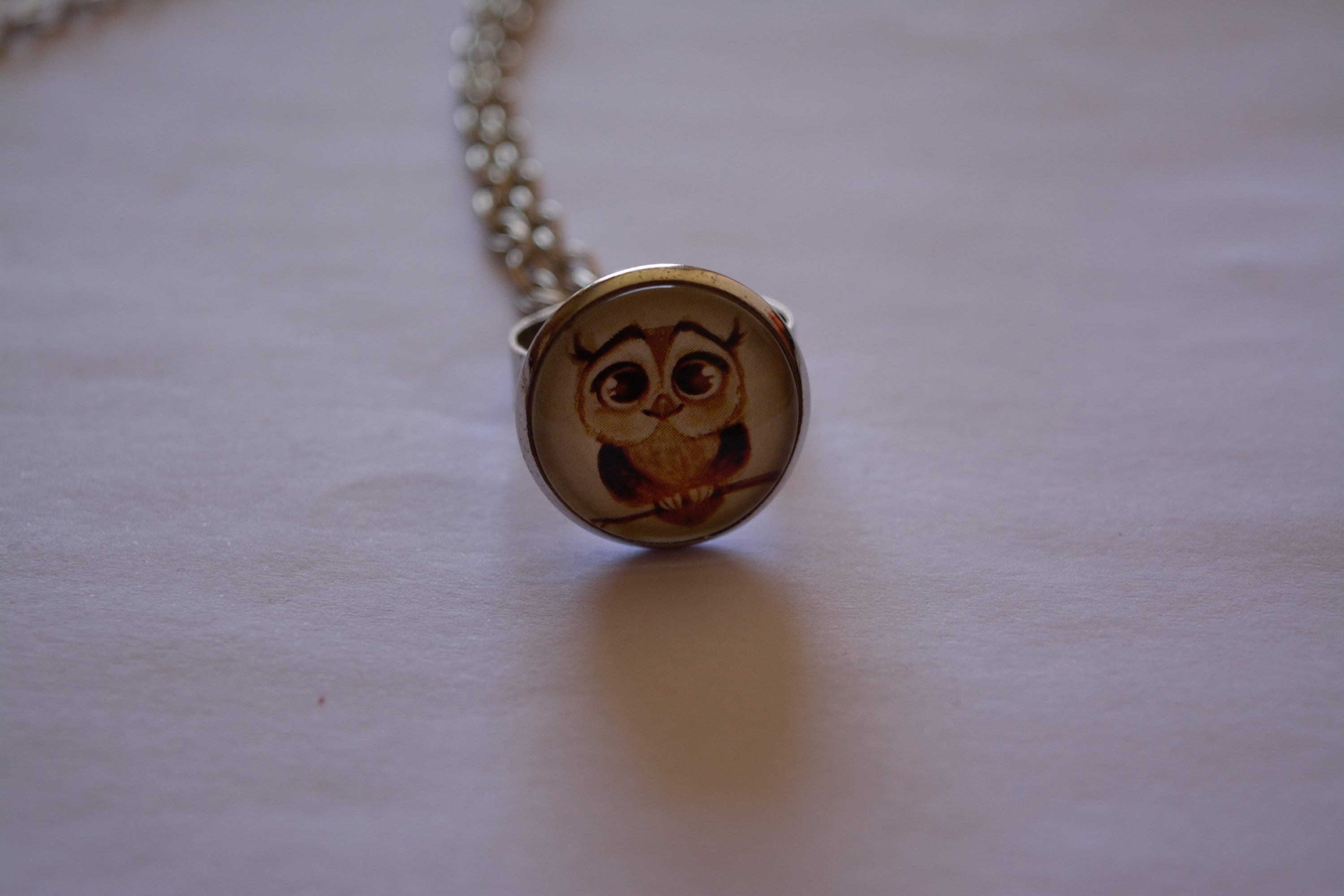 Unique handmade ring with an owl - adjustable, comes with a free shipping worldwide