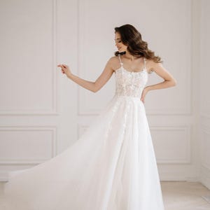 Floral wedding dress with trained skirt, guipure bridal gown with slim spaghetti straps, boho maxi dress