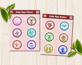 May include: Two rectangular sticker sheets with a light pink background, each featuring six circular zodiac sign stickers. The top of each sheet displays the text Zodiac Signs Stickers. The stickers depict Libra, Capricorn, Scorpio, Aquarius, Sagittarius, Pisces, Aries, Cancer, Taurus, Leo, Gemini, and Virgo symbols in various colors.