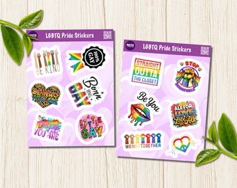 May include: Two sheets of LGBTQ Pride stickers on a light purple background. The stickers feature various designs including rainbow hearts, raised fists, lips, and text such as Be Kind, Born This Gay, Straight Outta The Closet, and We Rise Together.