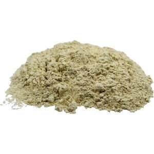 May include: A close-up of a pile of light beige ground ginger powder.
