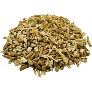 May include: A pile of dried, chopped herbs with a light brown color. The pieces vary in size and shape, with some appearing like small sticks and others more irregular. The herbs are likely used for culinary or medicinal purposes.