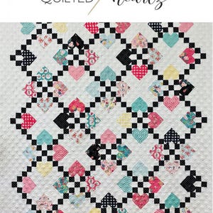 May include: A quilt pattern called "Cross My Heart" featuring a black and white checkered pattern with pink, yellow, and blue hearts. The quilt is 60 inches by 73 inches.