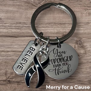 Melanoma / Skin Cancer Awareness Believe Keychain