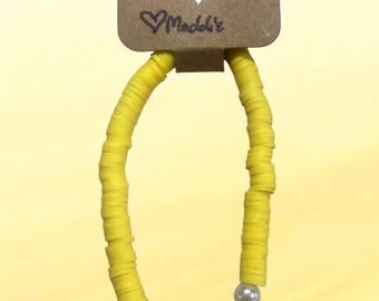 Pulsera elástica de la esperanza con lazo amarillo que representa la concientización sobre el amor, la fe y la esperanza.